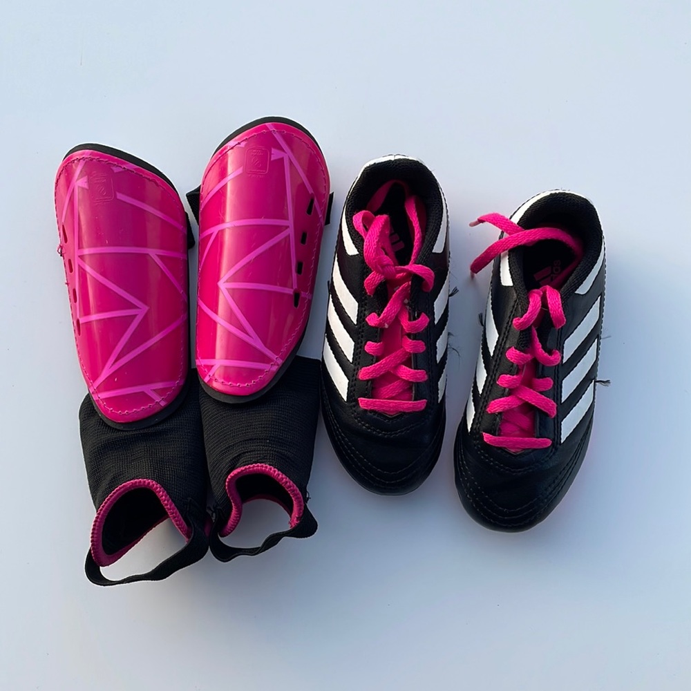 Adidas cleats and shin guards for soccer